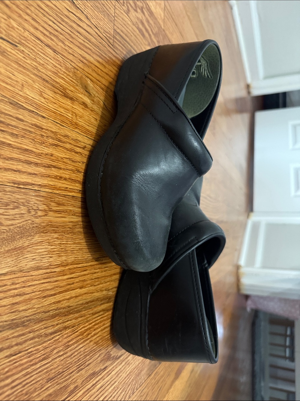 Dansko women’s Black Leather Clogs
